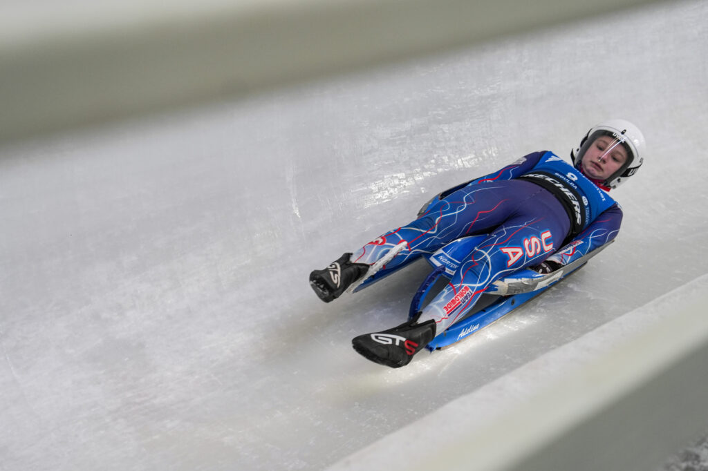 An athlete competing in athletic event sports with helmet