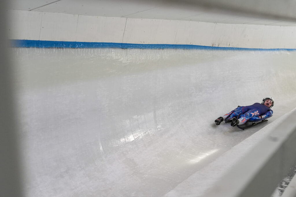 An athlete competing in athletic event sports with helmet