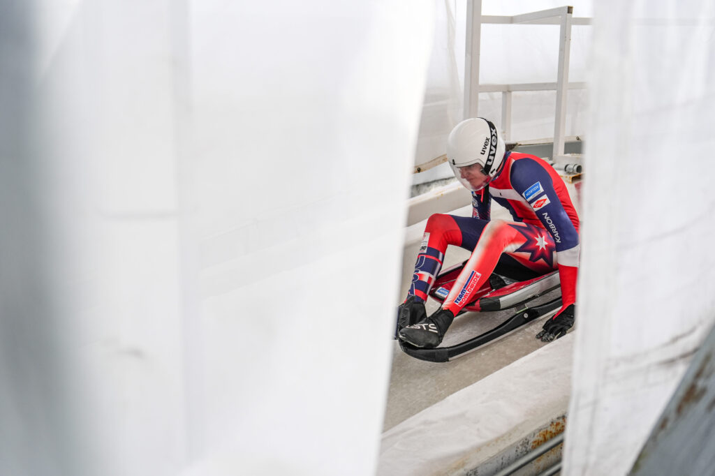 An athlete competing in athletic event sports with helmet