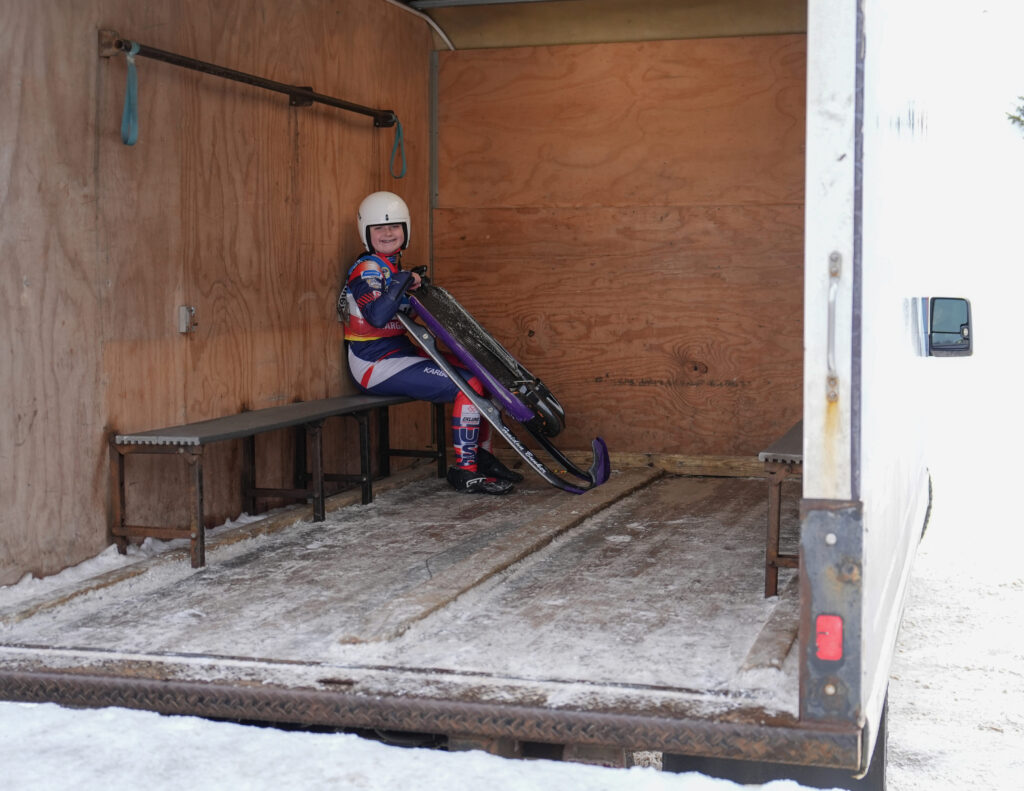 An athlete competing in athletic event sports with helmet