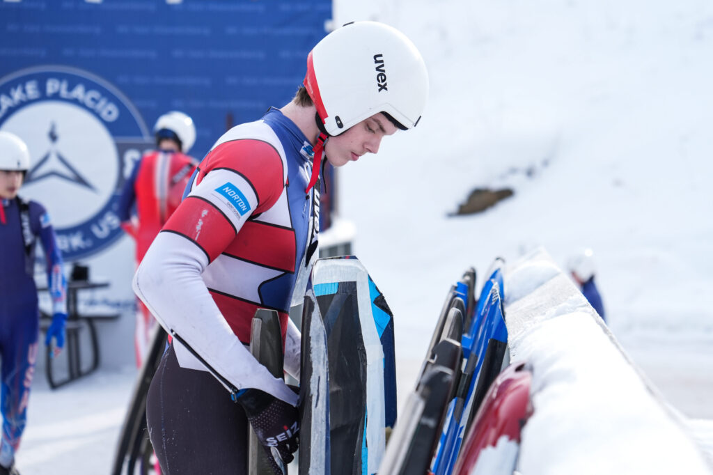 A group of athletes competing in athletic event sports with helmet