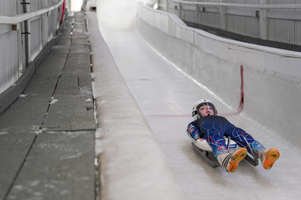 An athlete competing in athletic event sports with helmet
