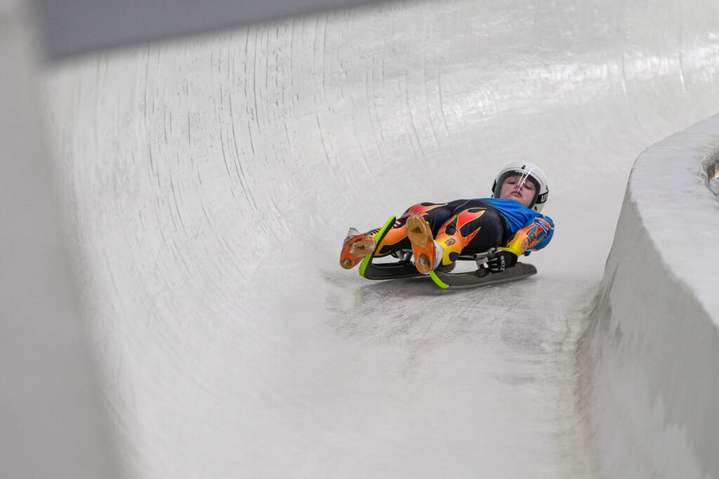 An athlete competing in athletic event sports with helmet