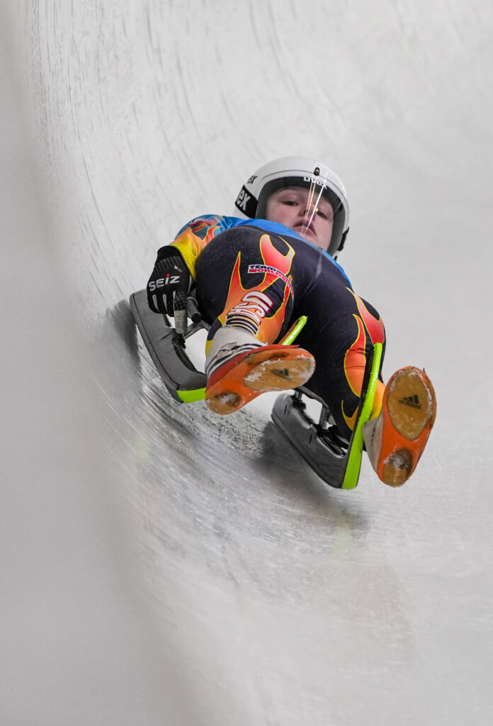 An athlete competing in athletic event sports with helmet
