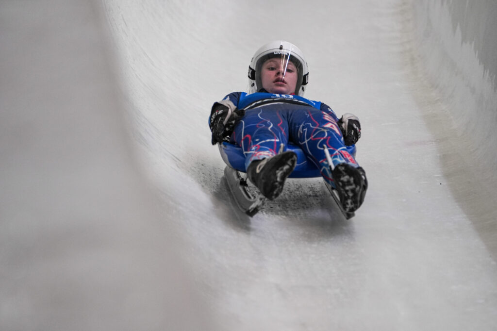An athlete competing in athletic event sports with helmet