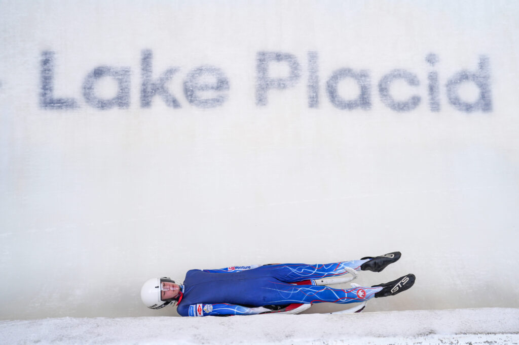 An athlete competing in athletic event sports with helmet