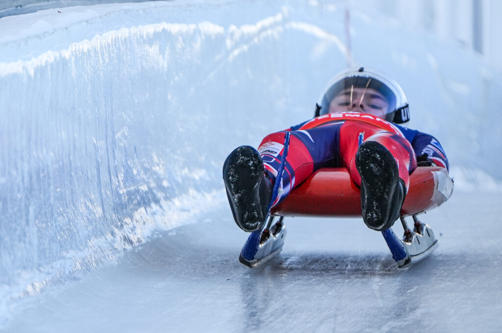 An athlete competing in athletic event sports with helmet