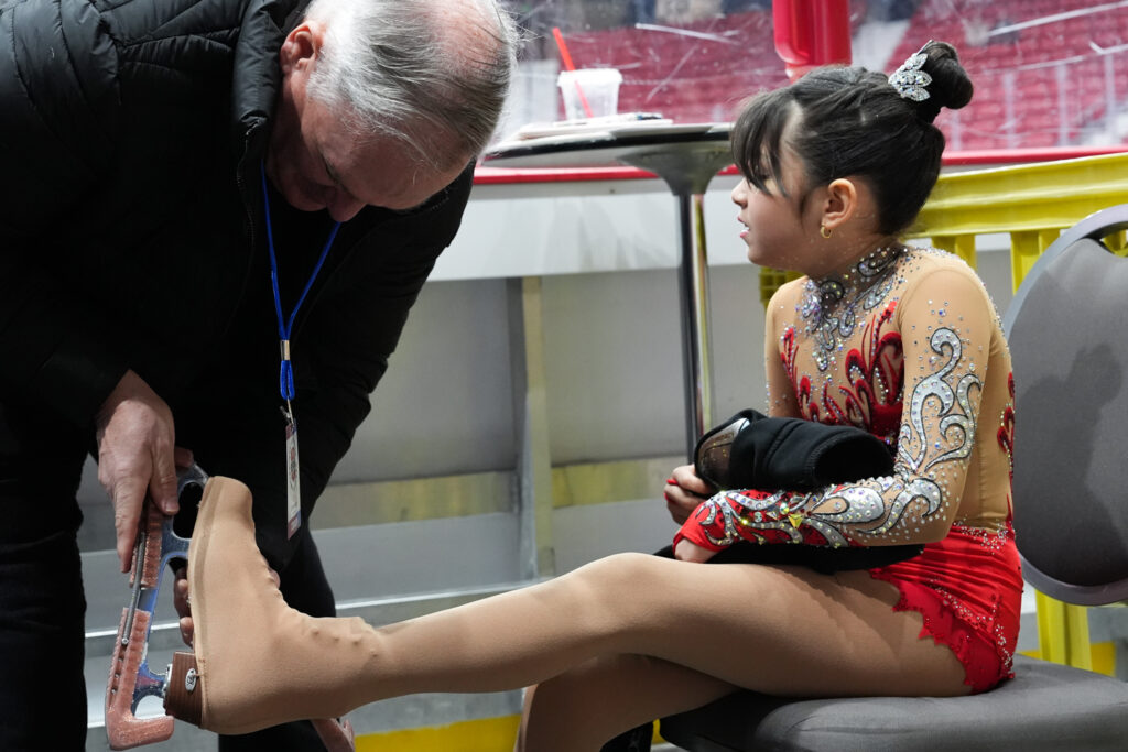 Two athletes competing in athletic event sports