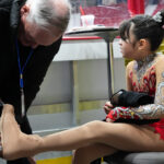 Two athletes competing in athletic event sports