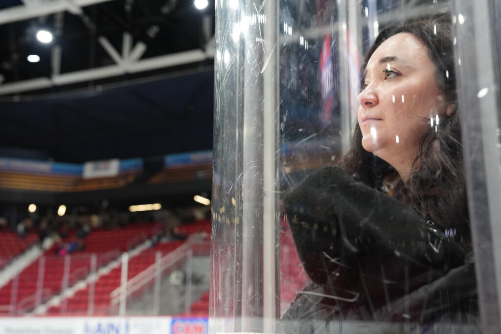 An athlete competing in athletic event sports