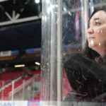 An athlete competing in athletic event sports