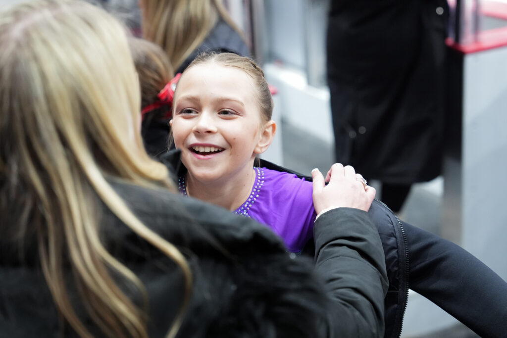 A group of athletes competing in athletic event sports