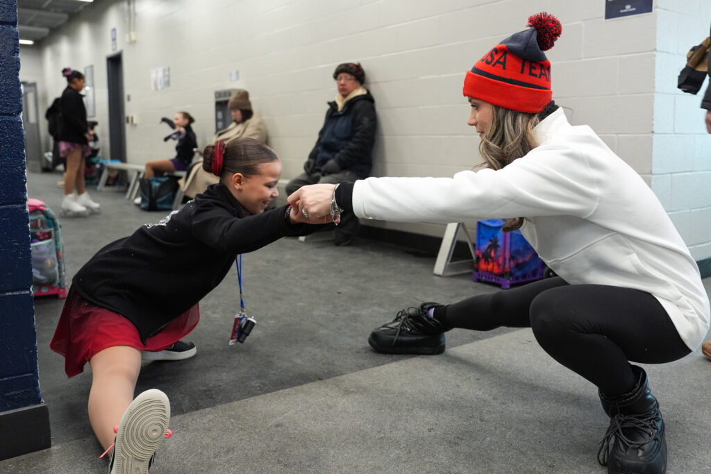 A group of athletes kicking