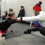 A group of athletes kicking