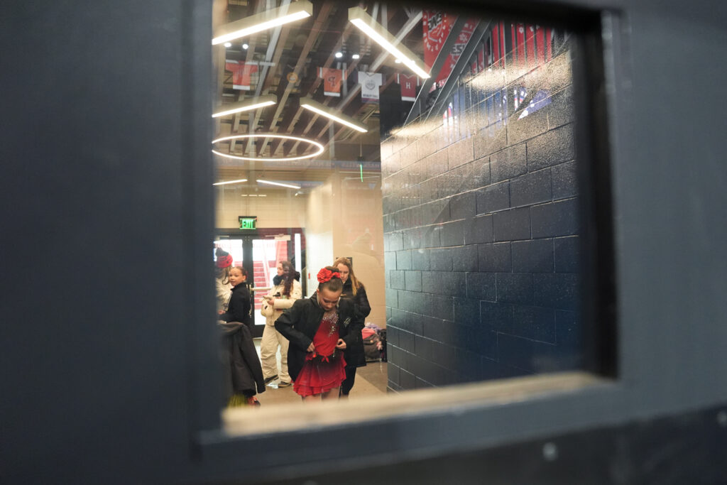 A group of athletes competing in athletic event sports