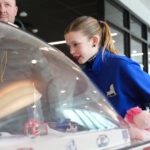 A group of athletes competing in athletic event sports