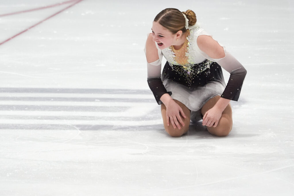 An athlete competing in athletic event sports