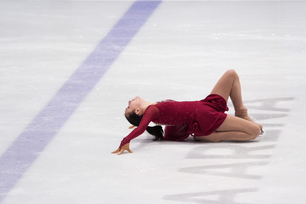 An athlete competing in athletic event sports