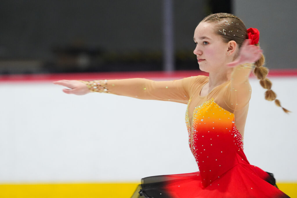 An athlete competing gymnastics