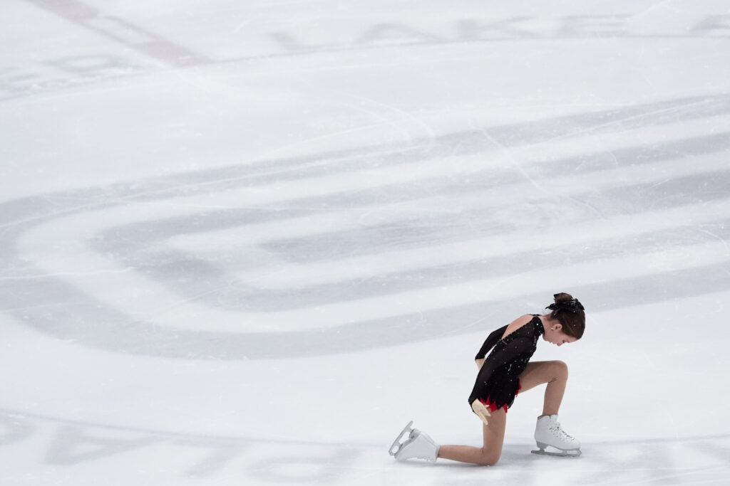 An athlete skating on the rink