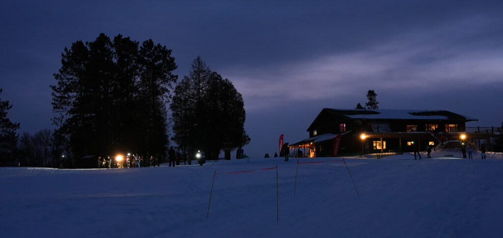 A group of athletes competing in athletic event sports outdoors