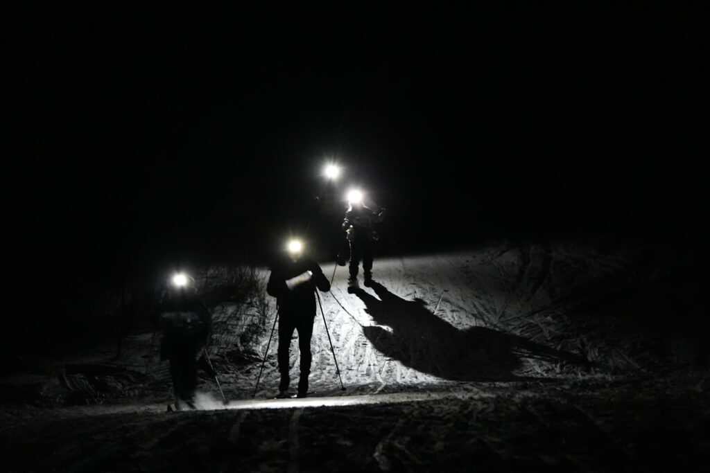 A group of athletes competing in athletic event sports