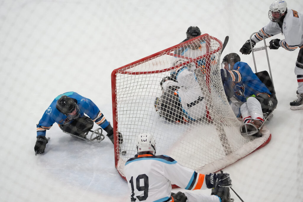 A group of athletes competing in athletic event sports with helmet