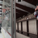 A group of athletes competing in athletic event sports