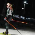 An athlete competing in athletic event sports