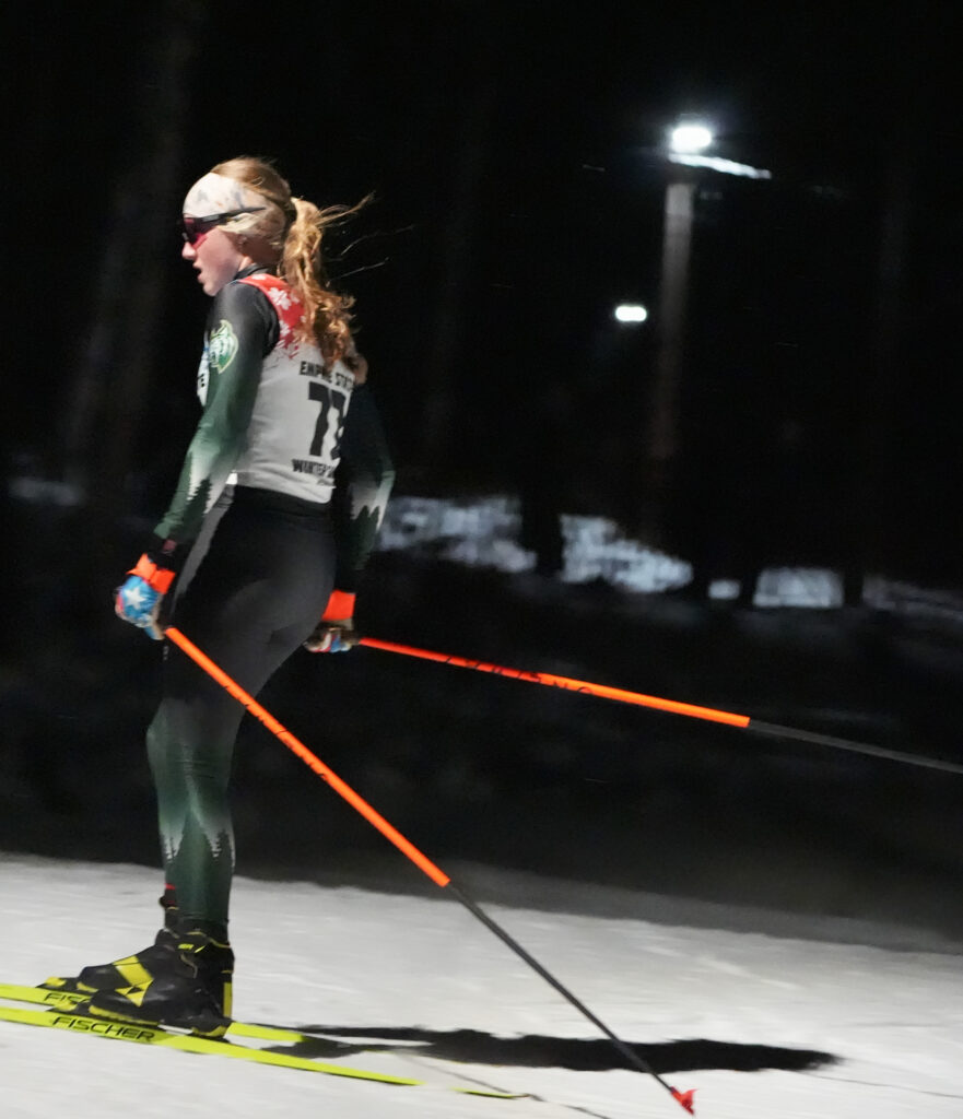 An athlete competing in athletic event sports