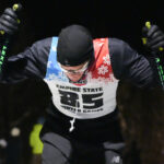 An athlete competing in athletic event sports in the snow