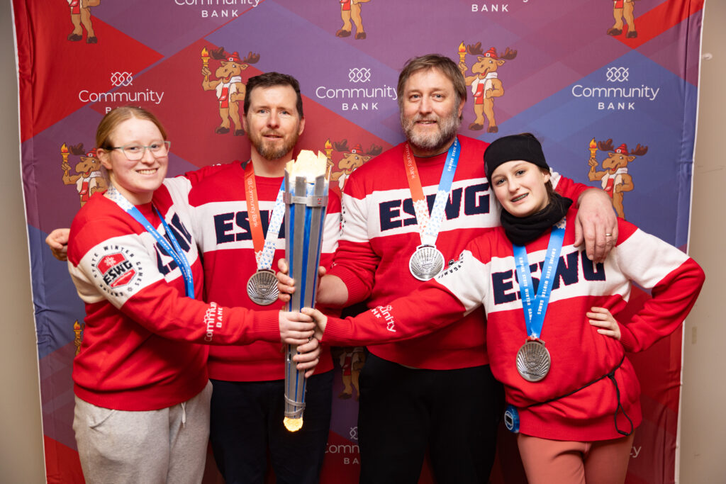 A group of athletes competing in athletic event sports