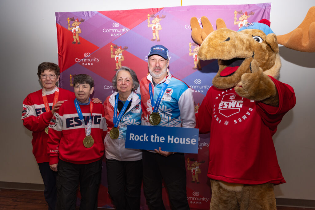 A group of athletes competing in athletic event sports