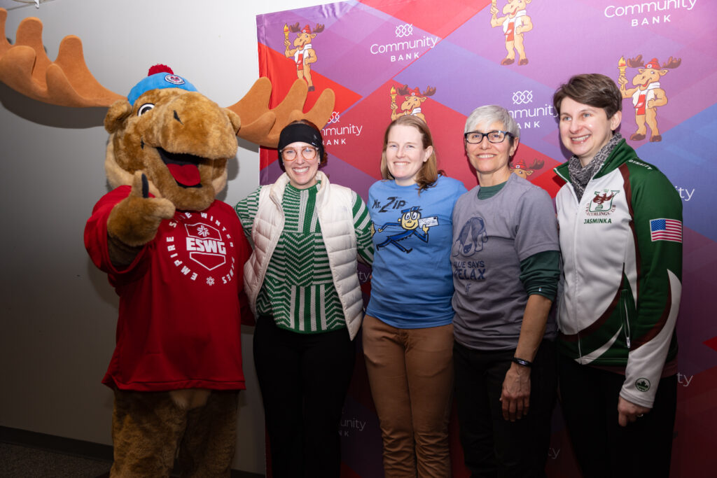 A group of athletes competing in athletic event sports