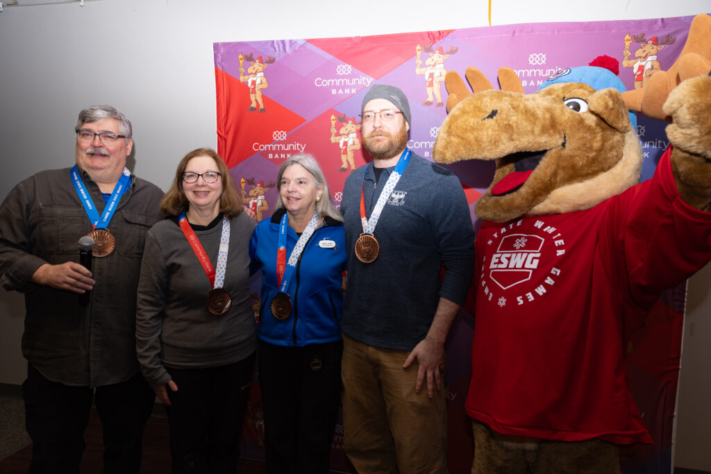 A group of athletes competing in athletic event sports