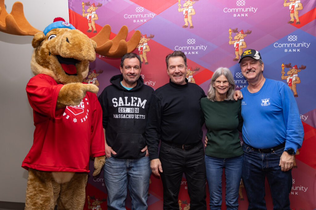 A group of athletes competing in athletic event sports