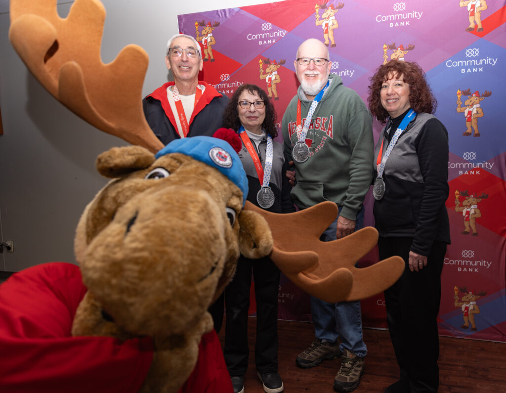 A group of athletes competing in athletic event sports