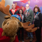 A group of athletes competing in athletic event sports