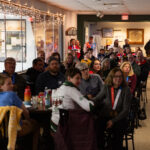 A group of athletes competing in athletic event sports