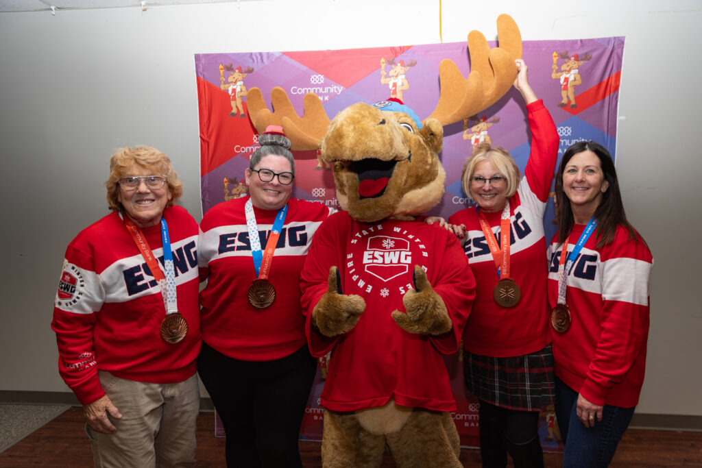 A group of athletes competing in athletic event sports