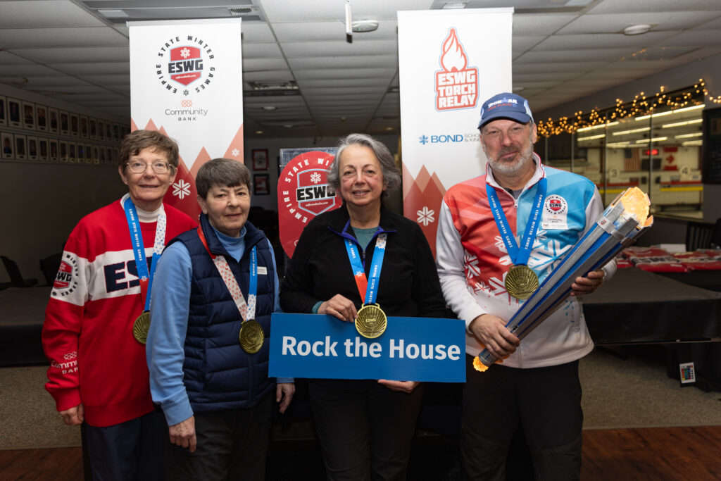 A group of athletes competing in athletic event sports