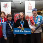 A group of athletes competing in athletic event sports