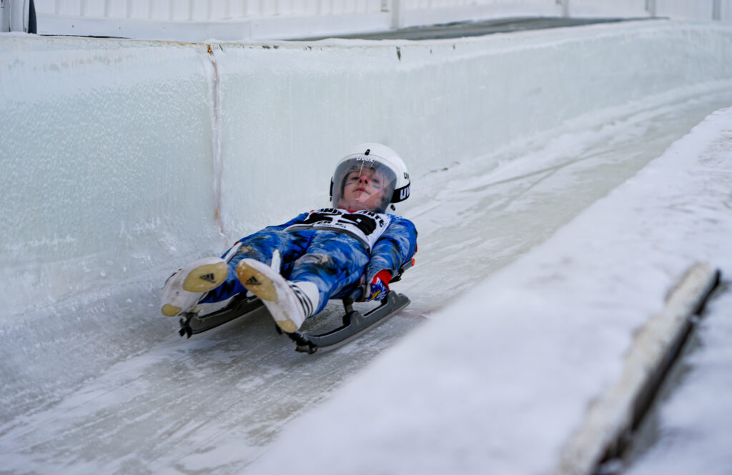 An athlete competing in athletic event sports with helmet