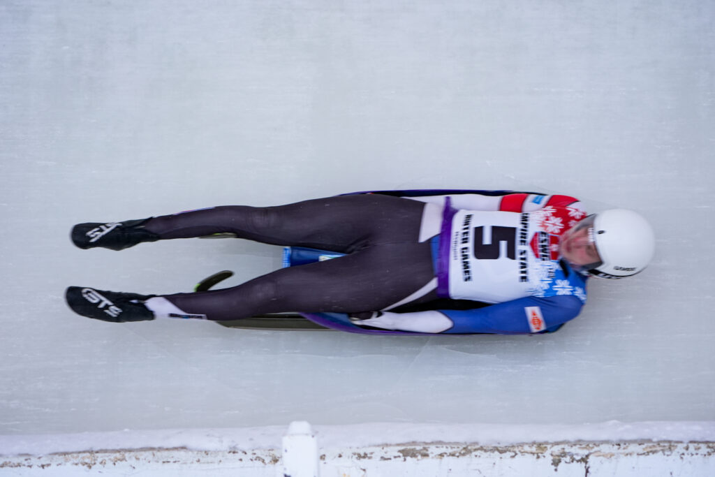 An athlete competing in athletic event sports with helmet