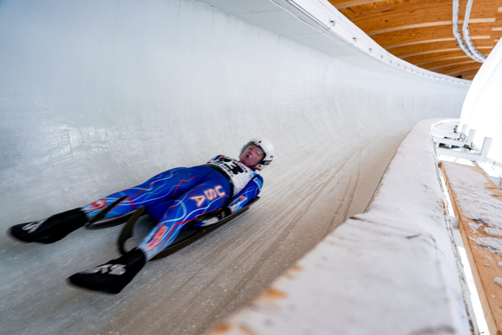 An athlete competing in athletic event sports with helmet