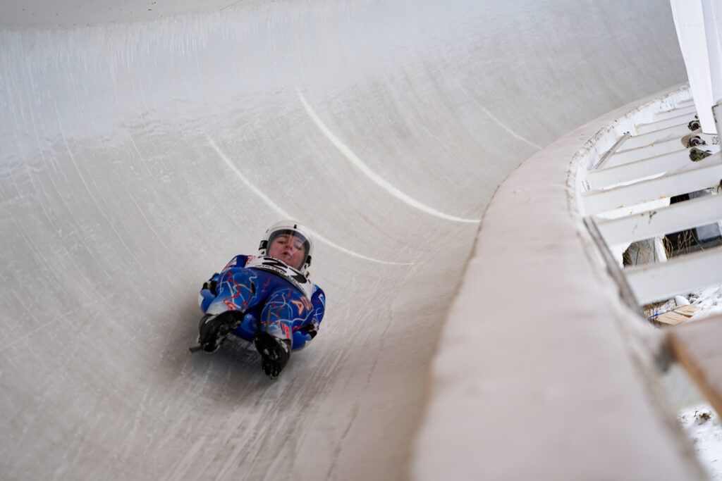 An athlete competing in athletic event sports with helmet