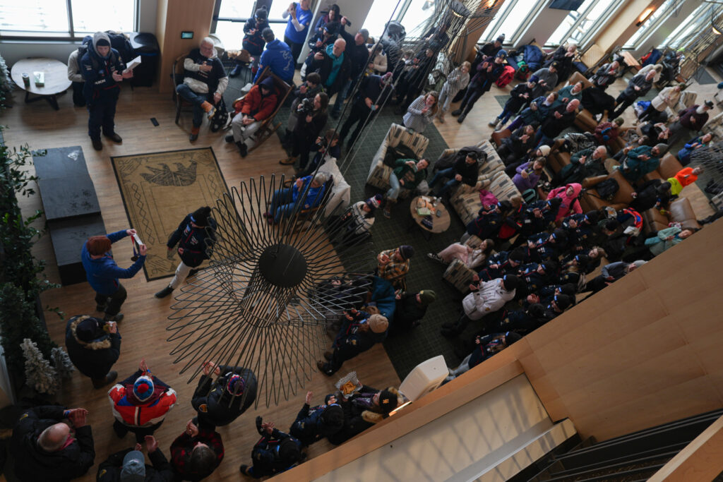 A group of athletes competing in athletic event sports