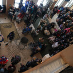 A group of athletes competing in athletic event sports