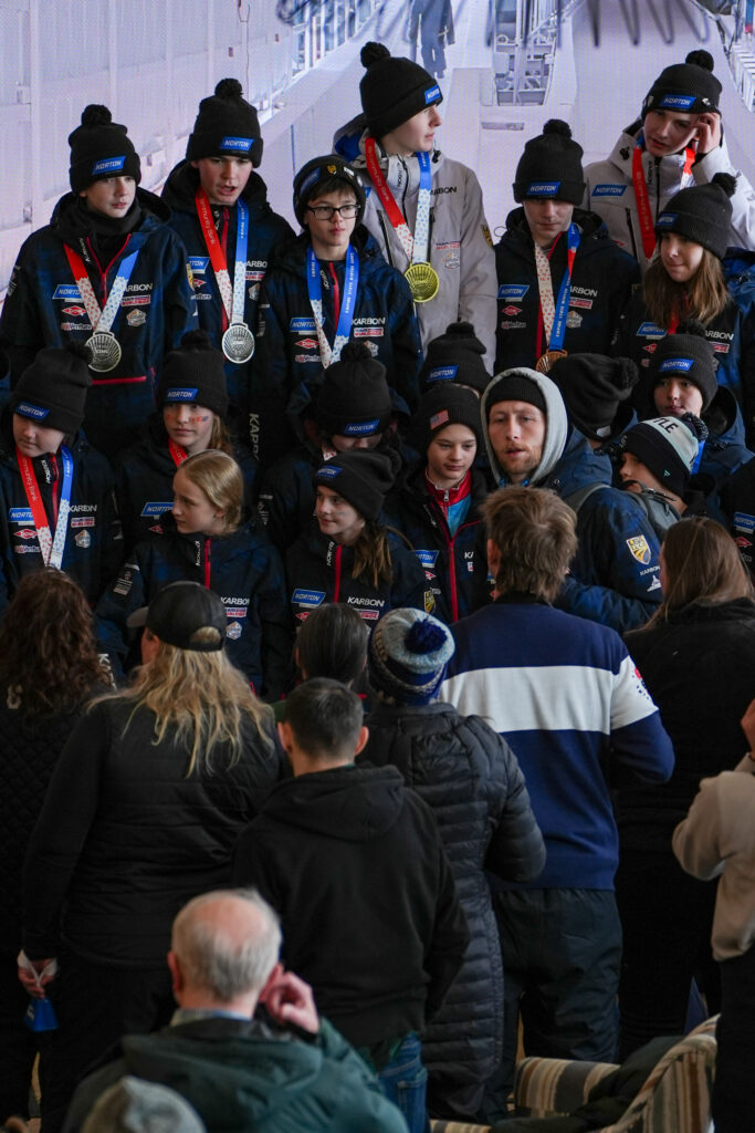 A group of athletes competing in athletic event sports with helmet