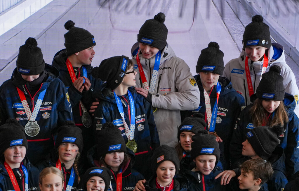 A group of athletes competing in athletic event sports